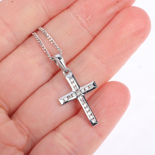 1274 - A modern 9ct white gold diamond cross pendant necklace, on 9ct fine curb link chain, total diamond c... 