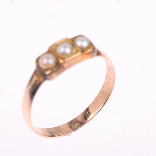 1277 - A Victorian three stone pearl mourning ring, apparently unmarked, closed-back settings, setting heig... 