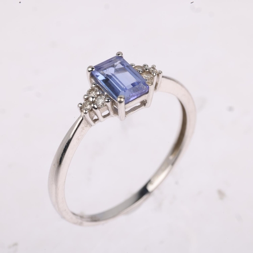 1282 - A modern 18ct white gold tanzanite and diamond dress ring, setting height 6.4mm, size M, 1.6g