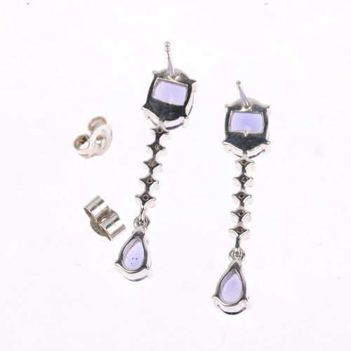 1283 - A pair of 9ct white gold tanzanite and diamond drop earrings, with stud fittings, 29.6mm, 4.1g