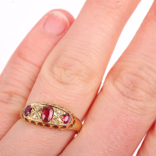 1286 - An early 20th century seven stone ruby and diamond half hoop ring, apparently unmarked, setting heig... 