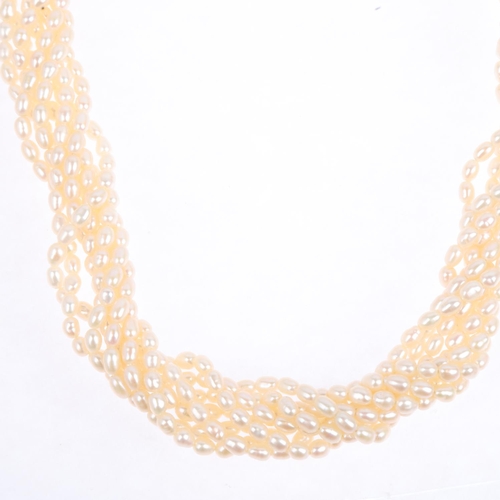 1290 - An 18ct white gold multi-strand pearl torsade necklace, 40cm, 61.6g