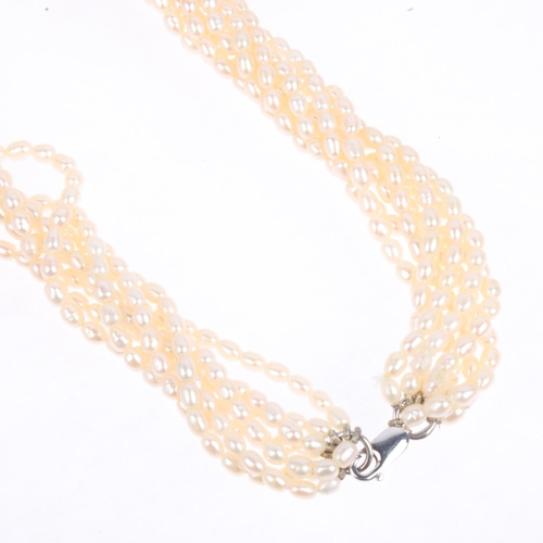 1290 - An 18ct white gold multi-strand pearl torsade necklace, 40cm, 61.6g