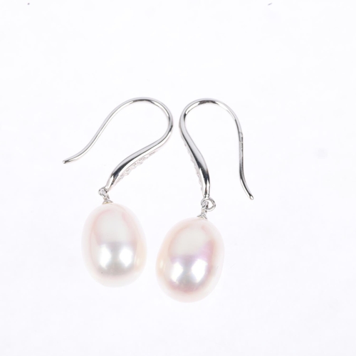 1291 - A pair of 9ct white gold whole pearl and diamond drop earrings, with shepherd hook fittings, 31mm, 4... 