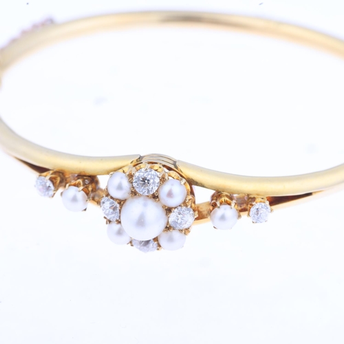 1300 - A Victorian pearl and diamond cluster hinged bangle, unmarked 18ct gold settings with old-cut diamon... 