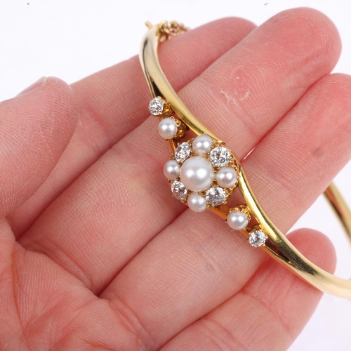 1300 - A Victorian pearl and diamond cluster hinged bangle, unmarked 18ct gold settings with old-cut diamon... 