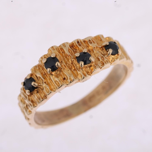 1303 - A 1970s 9ct gold sapphire band ring, London 1977, textured bark decoration, setting height 7.5mm, si... 