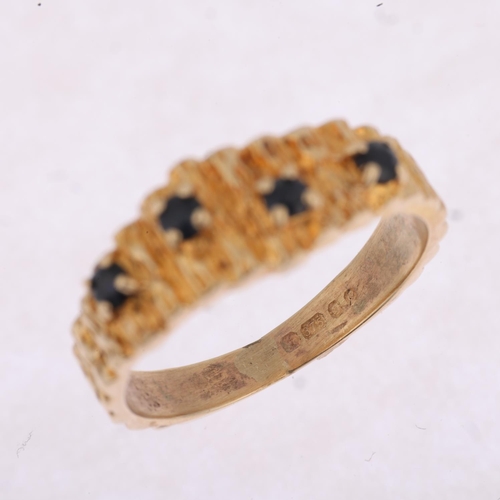 1303 - A 1970s 9ct gold sapphire band ring, London 1977, textured bark decoration, setting height 7.5mm, si... 