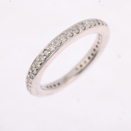 1304 - A diamond eternity ring, set with modern round brilliant-cut diamonds, total diamond content approx ... 