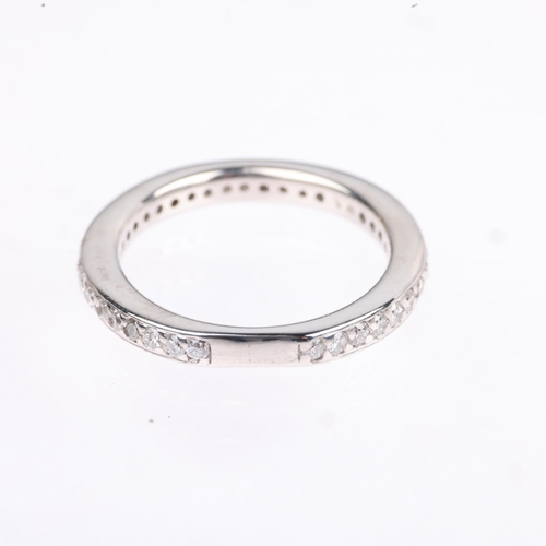 1304 - A diamond eternity ring, set with modern round brilliant-cut diamonds, total diamond content approx ... 