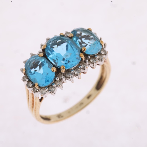 1307 - A 9ct gold blue topaz and diamond triple cluster ring, Birmingham 1999, setting height 11.1mm, size ... 