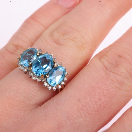 1307 - A 9ct gold blue topaz and diamond triple cluster ring, Birmingham 1999, setting height 11.1mm, size ... 