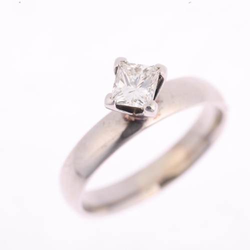 1312 - A 14ct white gold 0.7ct solitaire diamond ring, set with Princess-cut diamond, colour approx I/J, cl... 