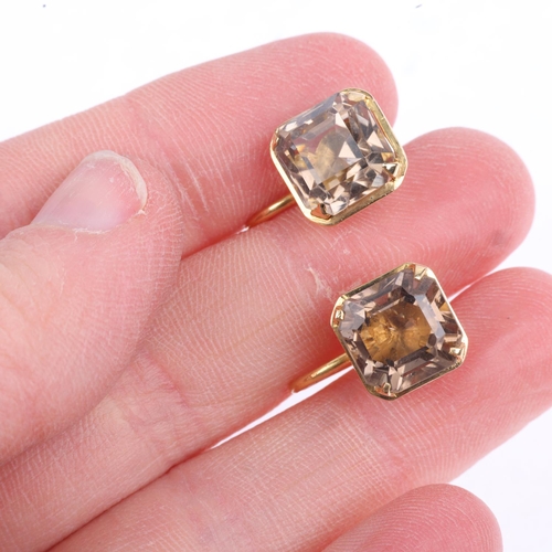 1317 - A pair of smoky quartz earrings, with unmarked gold screw-back fittings, 11mm, 5.1g