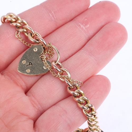 1334 - A 9ct rose gold solid curb link chain bracelet, with 9ct heart padlock clasp, maker JH&S, Birmingham... 