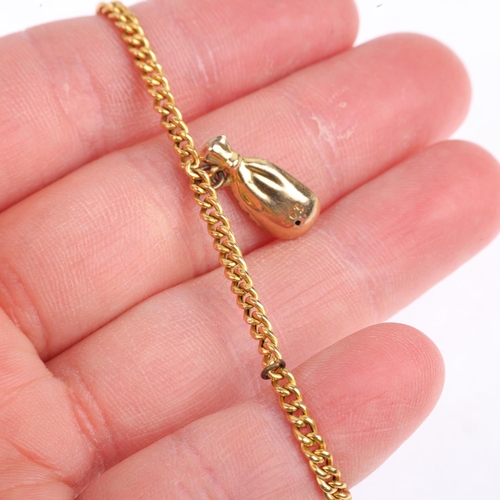 1341 - An 18ct gold hollow curb link chain bracelet with 9ct moneybag charm, 16cm, 2.1g