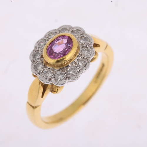 1342 - An 18ct gold pink sapphire and diamond flowerhead cluster ring, maker AT Ltd, rub-over set with oval... 