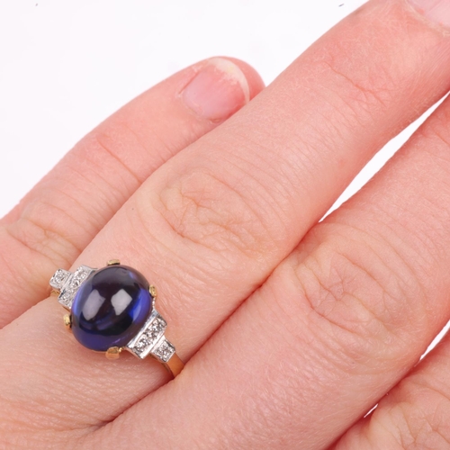 1346 - An 18ct gold iolite and diamond dress ring, maker S&R, London 1976, claw set with oval cabochon ioli... 