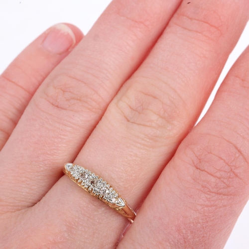 1347 - An early 20th century 18ct gold graduated five stone diamond half hoop ring, platinum-topped, set wi... 