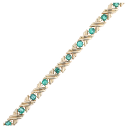 1349 - A modern 9ct gold emerald tennis line bracelet, 19cm, 6g