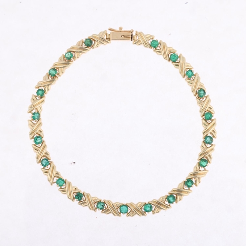 1349 - A modern 9ct gold emerald tennis line bracelet, 19cm, 6g