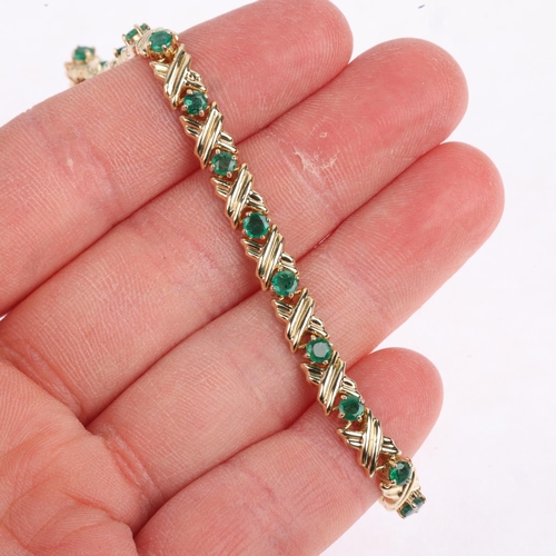 1349 - A modern 9ct gold emerald tennis line bracelet, 19cm, 6g