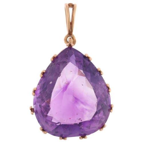 1352 - A late 20th century French 9ct gold amethyst drop pendant, claw set with 24ct pear-cut amethyst, 35.... 