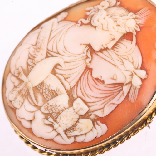 1359 - A 19th century shell 'Eos and Nyx' cameo brooch, relief carved depicting Goddesses, in unmarked yell... 