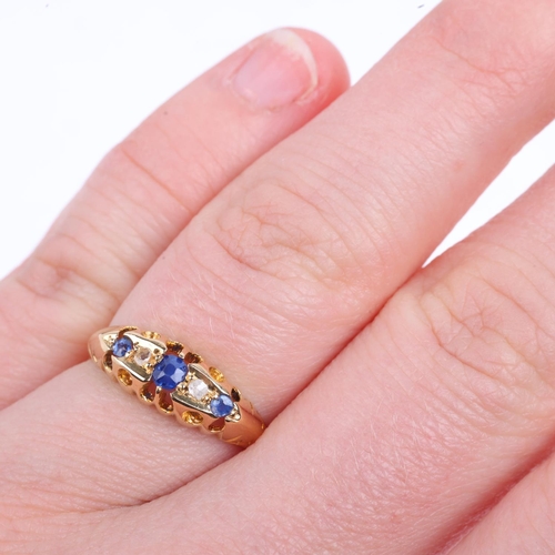 1370 - An early 20th century 18ct gold graduated five stone sapphire and diamond half hoop ring, maker CGH,... 