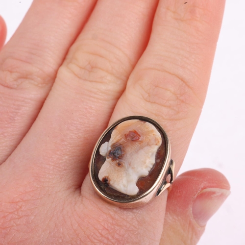 1383 - An Antique Jasper hardstone cameo ring, high relief carved depicting female profile, in unmarked gol... 