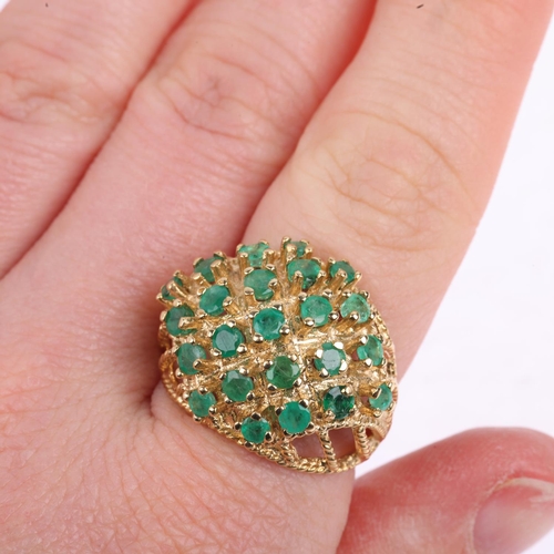 1384 - A large 1970s 9ct gold emerald bombe ring, maker H&M, London 1972, setting height 19.4mm, size O, 5.... 