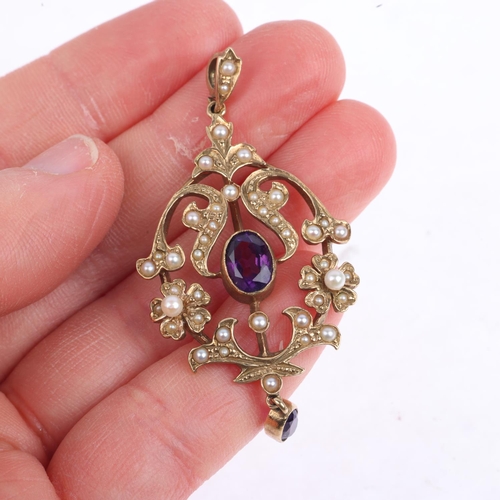 1386 - A late 20th century 9ct gold amethyst and pearl openwork pendant necklace, in the Edwardian style, i... 