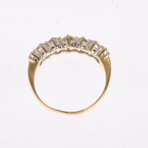 1391 - An 18ct gold graduated seven stone diamond half hoop ring, set with modern round brilliant-cut diamo... 