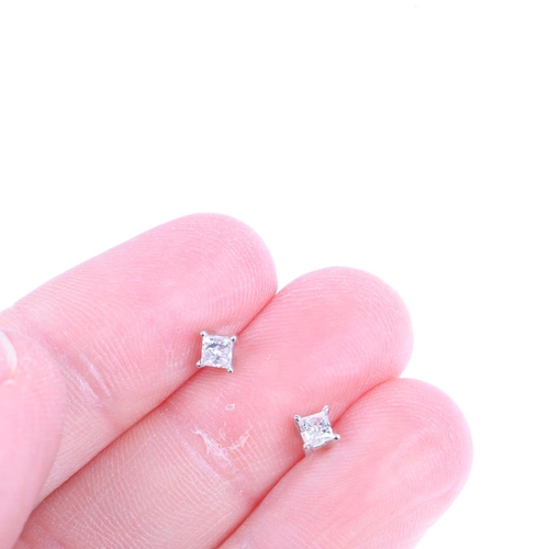 1401 - A pair of 14ct white gold 0.2ct solitaire diamond earrings, each set with 0.1ct Princess-cut diamond... 