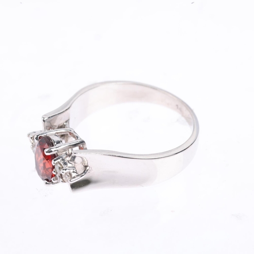 1406 - A modernist 14ct white gold garnet and diamond dress ring, maker KEL, setting height 7.2mm, size N, ... 