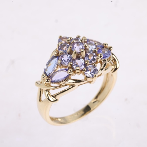 1407 - A 9ct gold tanzanite cluster dress ring, setting height 14.7mm, size P, 4.1g