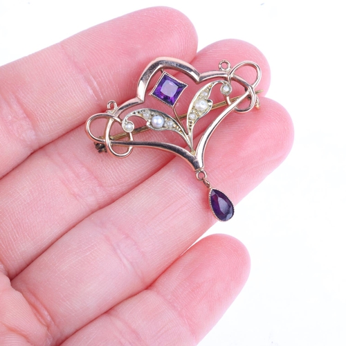 1411 - An Edwardian 9ct rose gold amethyst and pearl openwork brooch, 32.7mm, 2.6g