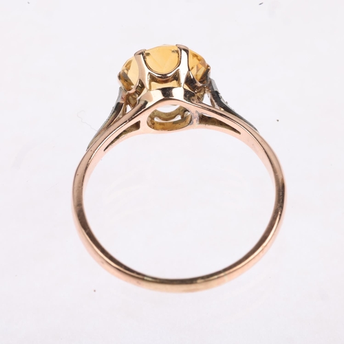 1415 - A Vintage citrine and diamond dress ring, claw set with round-cut citrine and rose-cut diamonds, app... 