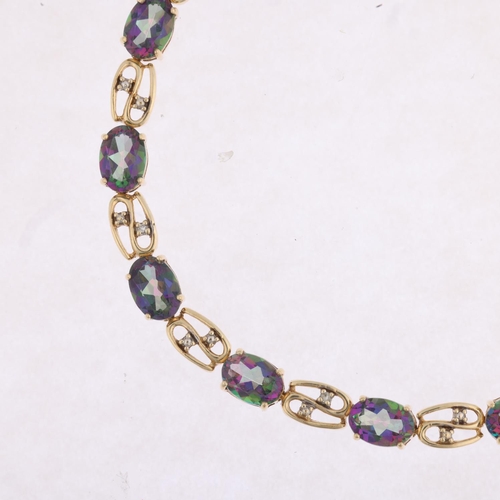 1416 - A 9ct gold mystic topaz tennis line bracelet, 20cm, 6.7g