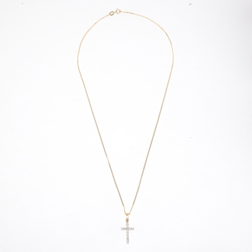 1417 - An 18ct gold diamond cross pendant necklace, on 9ct fine curb link chain, total diamond content appr... 