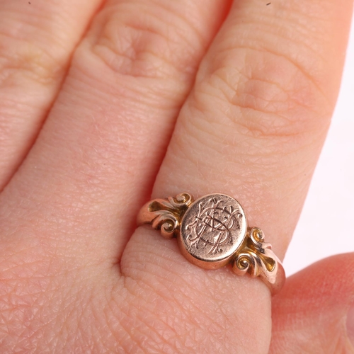 1427 - An early 20th century 9ct rose gold signet ring, maker WG&S, Birmingham 1911, central oval panel wit... 