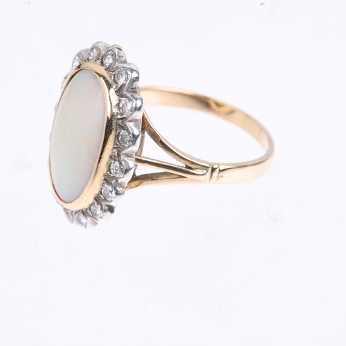 1430 - A late 20th century opal and diamond oval cluster ring, centrally set with 2.4ct oval cabochon white... 