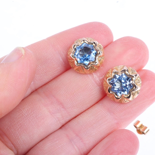 1433 - A pair of 18ct gold blue paste flowerhead earrings, with stud fittings, 13.8mm, 4.7g