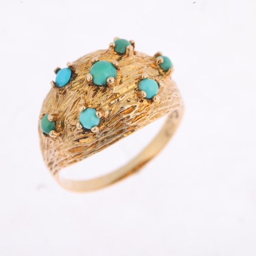 1435 - A 1960s modernist 9ct gold turquoise bombe ring, maker CJ Ltd, London 1968, textured bark decoration... 