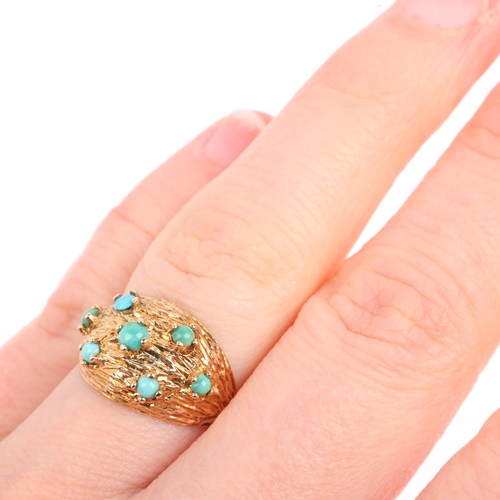 1435 - A 1960s modernist 9ct gold turquoise bombe ring, maker CJ Ltd, London 1968, textured bark decoration... 