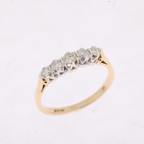 1440 - A late 20th century 9ct gold graduated five stone diamond half hoop ring, London 1983, claw set with... 