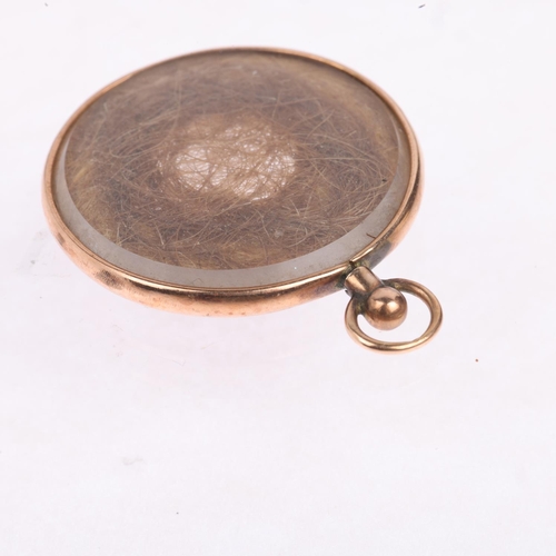 1441 - An early 20th century 9ct rose gold double-sided photo locket memorial pendant, maker D&Co, Chester ... 