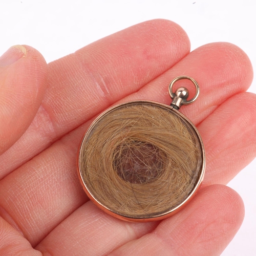 1441 - An early 20th century 9ct rose gold double-sided photo locket memorial pendant, maker D&Co, Chester ... 