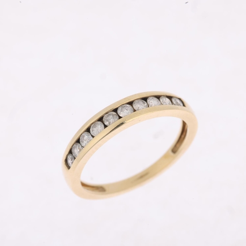 1443 - A 9ct gold diamond half eternity ring, channel set with modern round brilliant-cut diamonds, total d... 