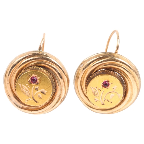 1446 - A pair of Victorian garnet earrings, unmarked gold settings with engraved floral decoration and shep... 